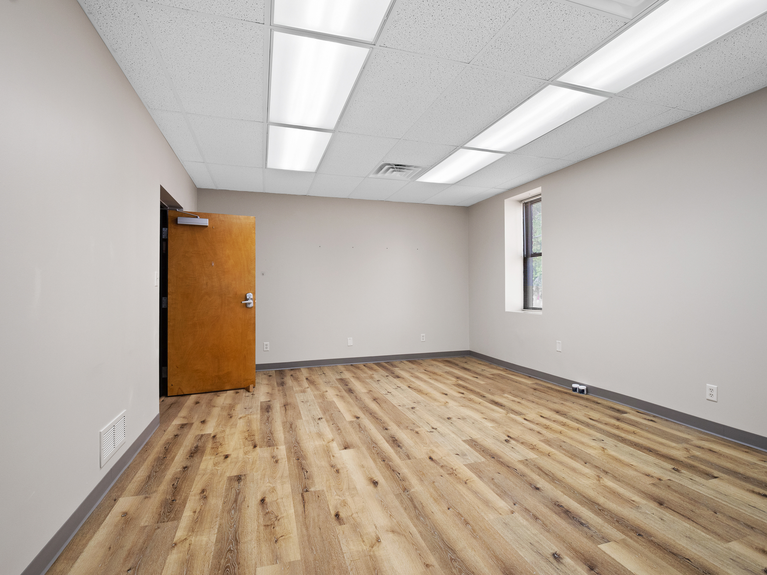 Bright office with wood floors